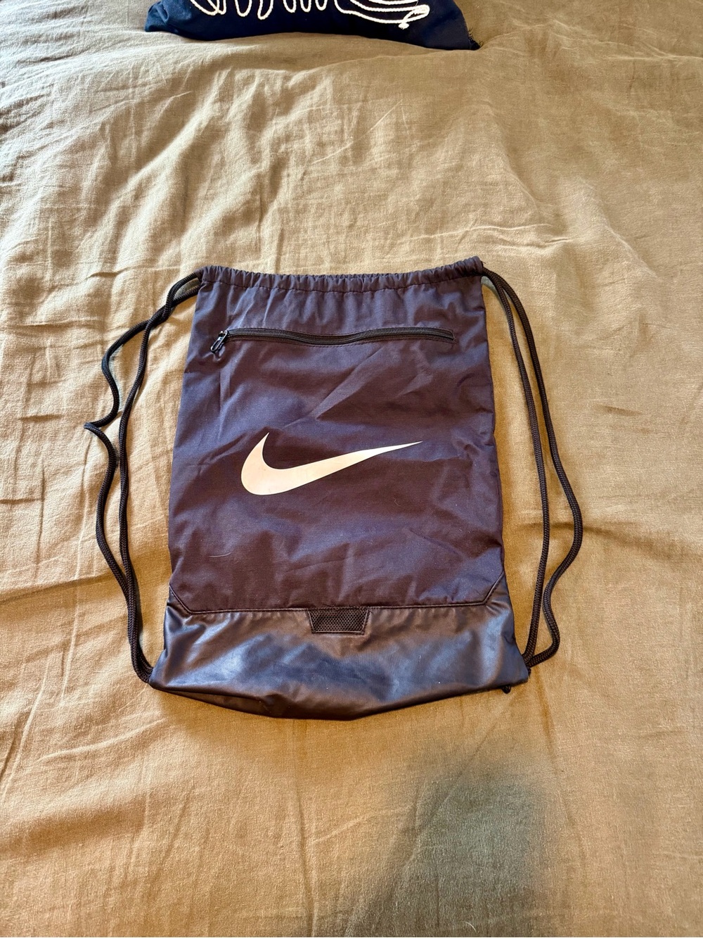 Nike Black Drawstring Backpack with White Swoosh Logo